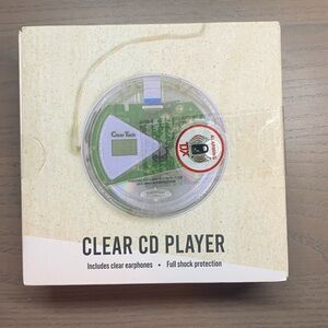 New in sealed box. Clear Tech Clear CD Player. Including Earphone . Portable